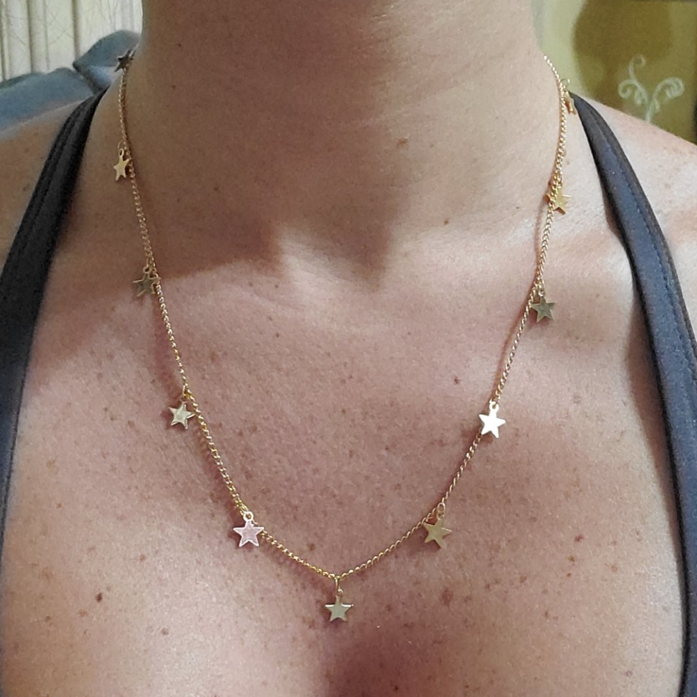 Gold tone star necklace 17"-19"